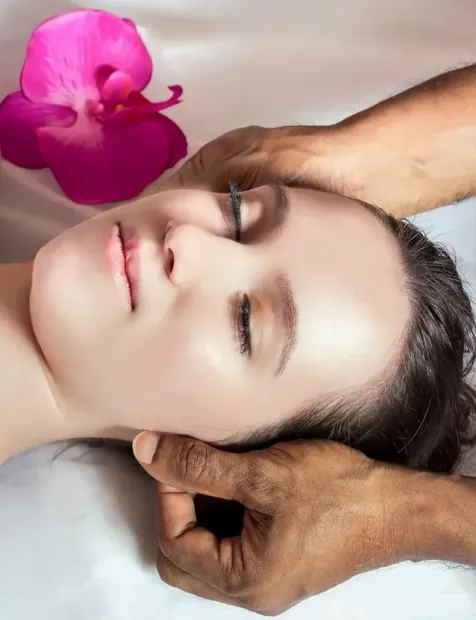Woman relaxing with orchid